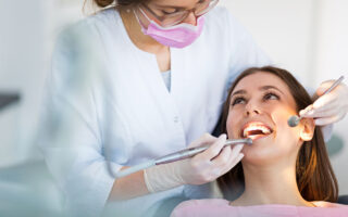 Dentist and patient in dentist office